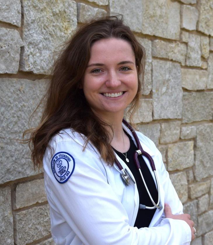 Jackie Ganser in nursing white coat 